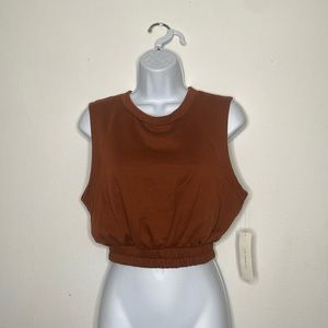 Sleeveless burnt orange crop top